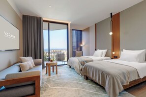 Premium bedding, down comforters, minibar, in-room safe