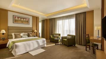 Suíte luxo, 1 cama King | Frigobar, escrivaninha, quartos à prova de som