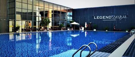 Outdoor pool, open 9:00 AM to 9:00 PM, sun loungers