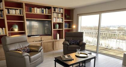 Appartement panoramique au centre de Moulins avec terrasse, 2 chambres, et équipements modernes