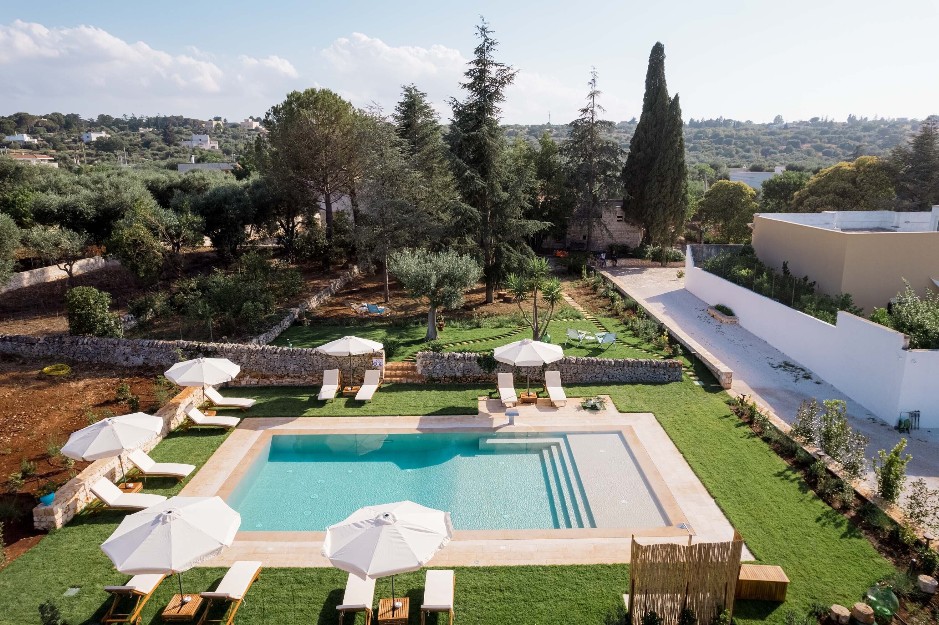 Seasonal outdoor pool, pool umbrellas, sun loungers