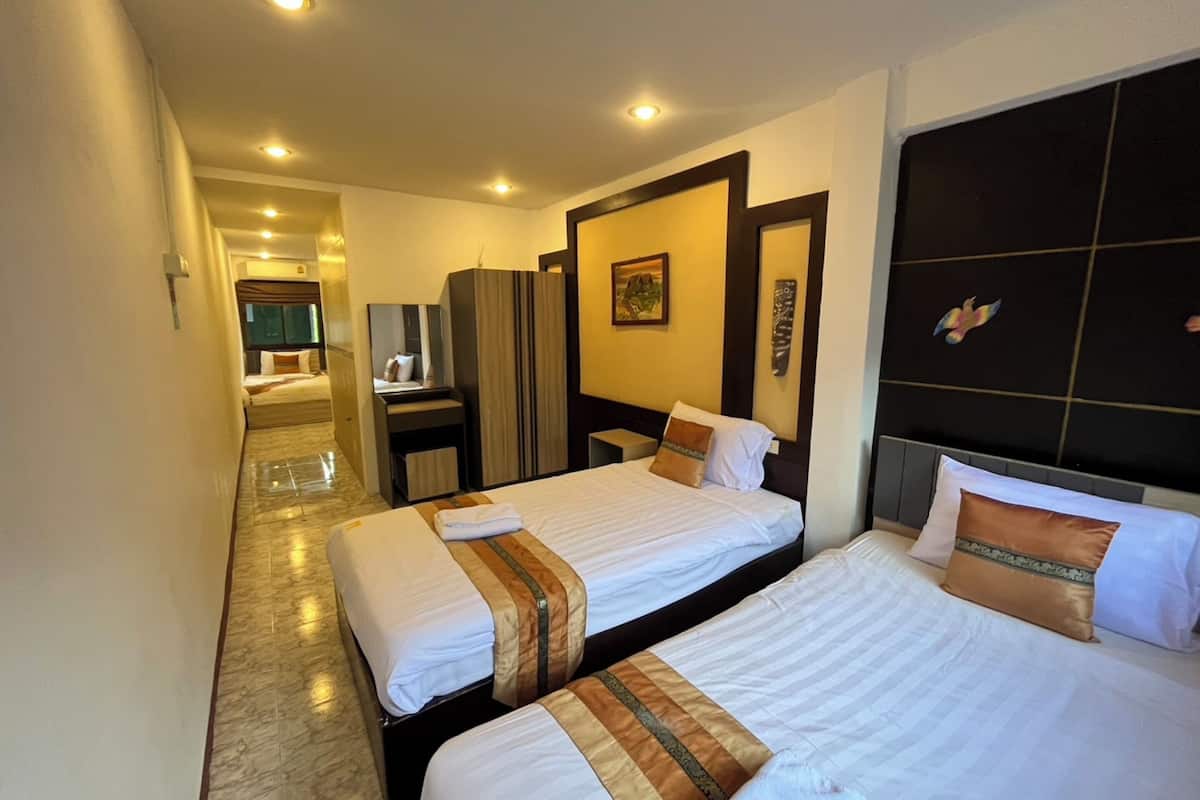 Chambre Triple Deluxe | 1 chambre, Wi-Fi gratuit, draps fournis