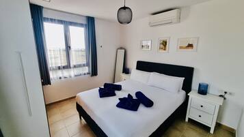 3 dormitorios, tabla de planchar con plancha, wifi gratis y ropa de cama