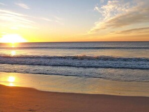 A beach with waves and a sunset. - Bch Q 1BR 1BA w Ocean Front Balcony - sleeps 6 (Virginia Beach)