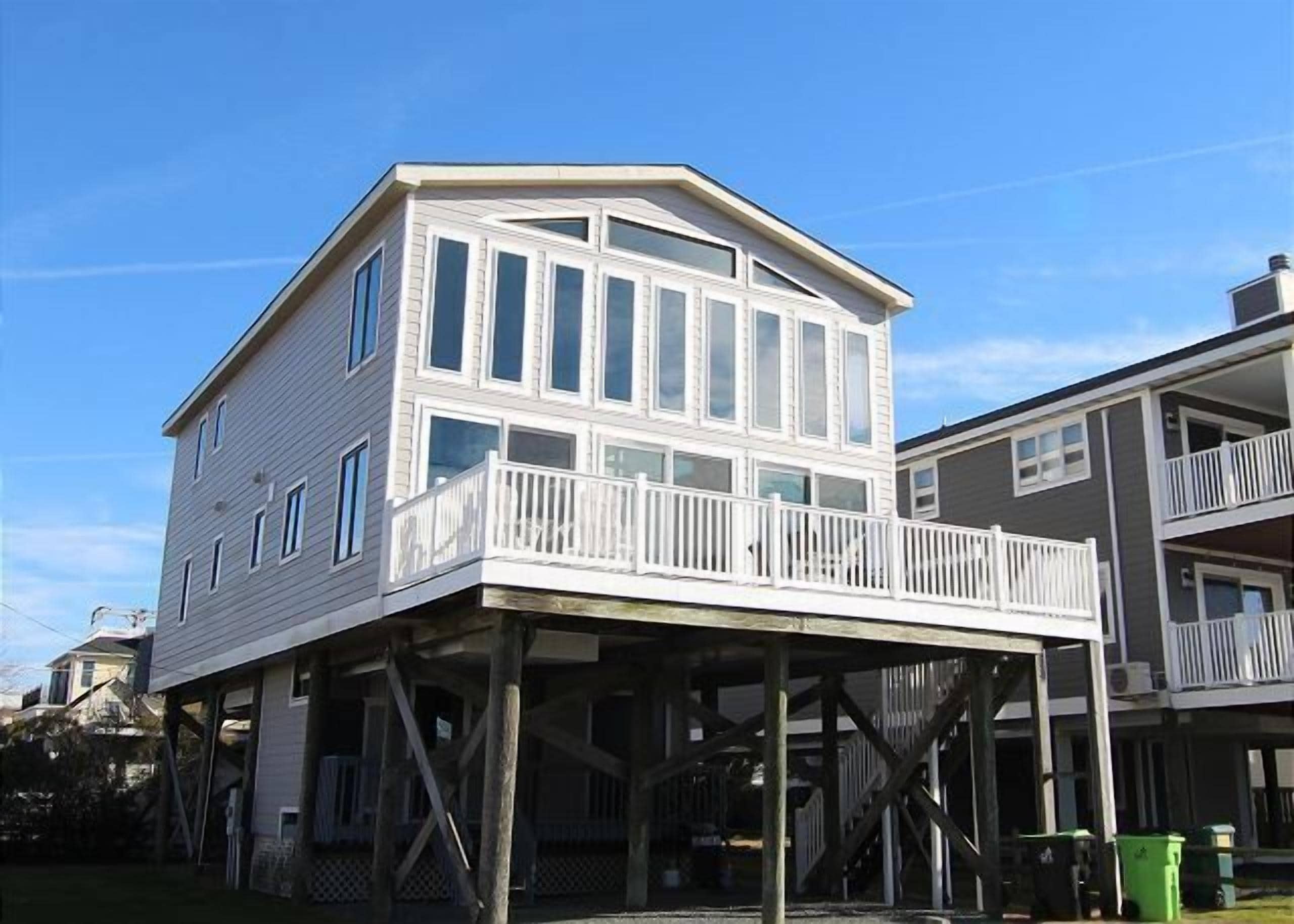 Dewey Beach home, This stunner is bay facing perfect sunset and waterway viewing.