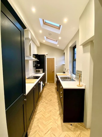 Fridge, microwave, oven, stovetop. The Hideaway - Quiet cottage, a short walk from the historic centre of York.