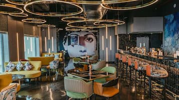 2 bars/lounges, rooftop bar