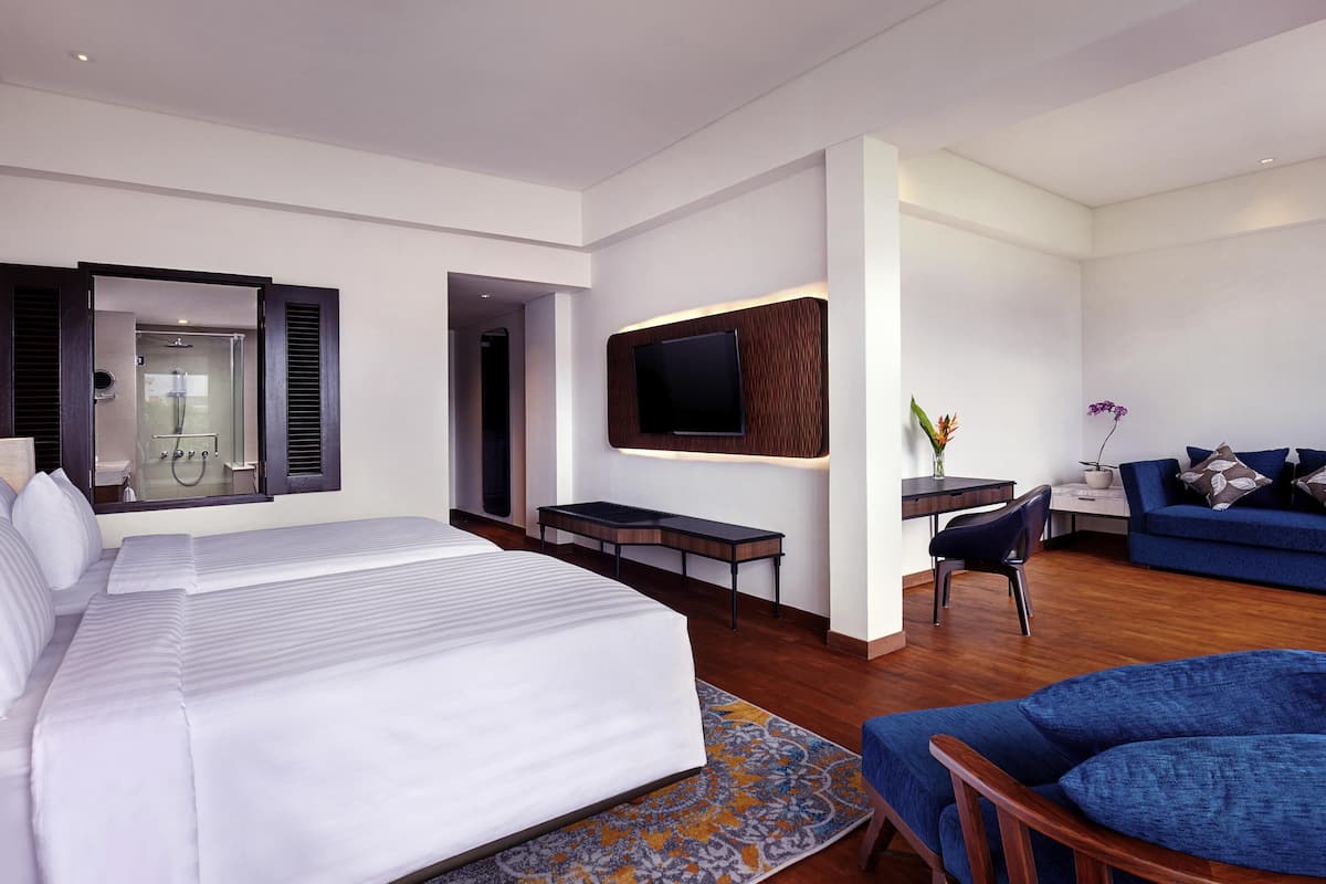 Junior Suite, Multiple Beds | In-room safe, desk, laptop workspace, iron/ironing board