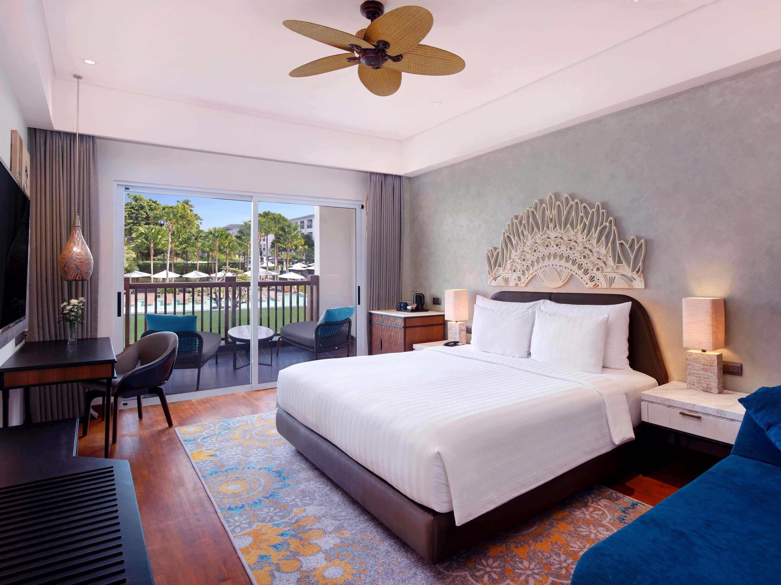 Deluxe Room, 1 King Bed, Pool View | In-room safe, desk, laptop workspace, iron/ironing board