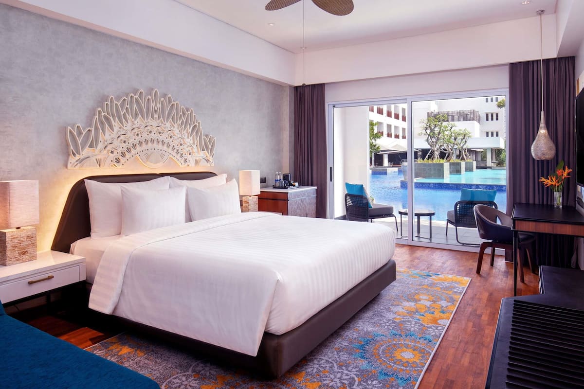 Deluxe Room, 1 King Bed, Pool Access | In-room safe, desk, laptop workspace, iron/ironing board
