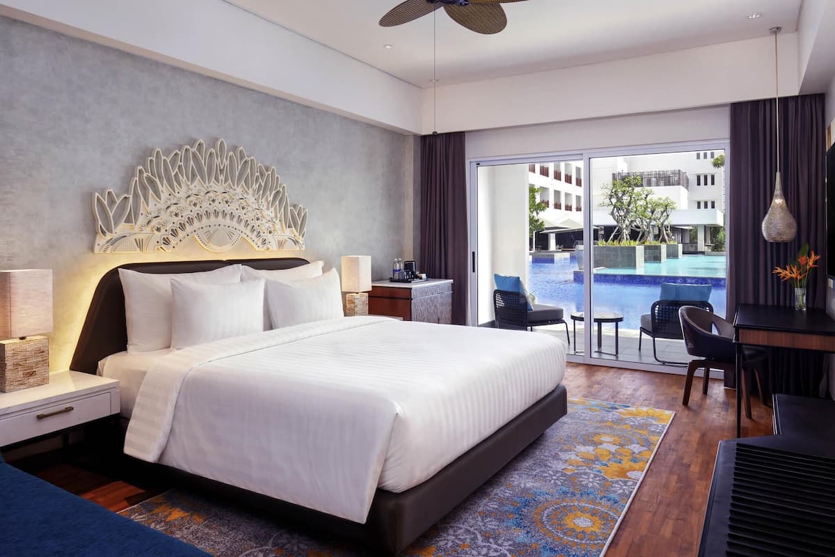 Deluxe Room, 1 King Bed, Pool Access | In-room safe, desk, laptop workspace, iron/ironing board