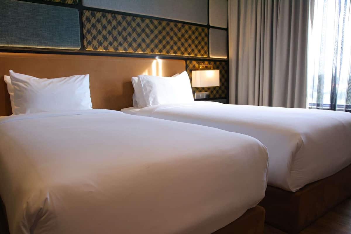 Deluxe Twin Room, 2 Twin Beds | In-room safe, blackout drapes, iron/ironing board, free WiFi