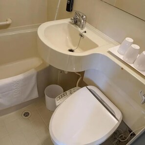Deep-soaking bathtub, rainfall showerhead, eco-friendly toiletries
