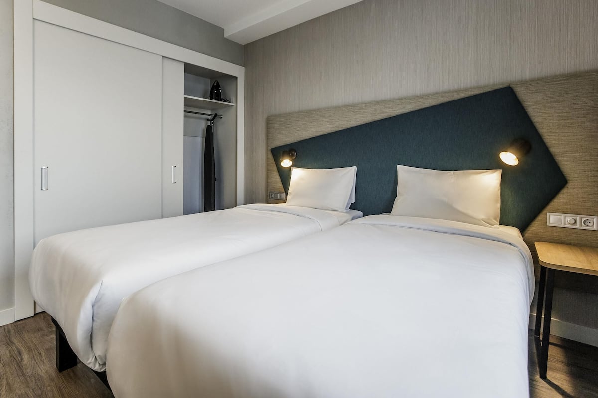 Hypo-allergenic bedding, desk, laptop workspace, soundproofing