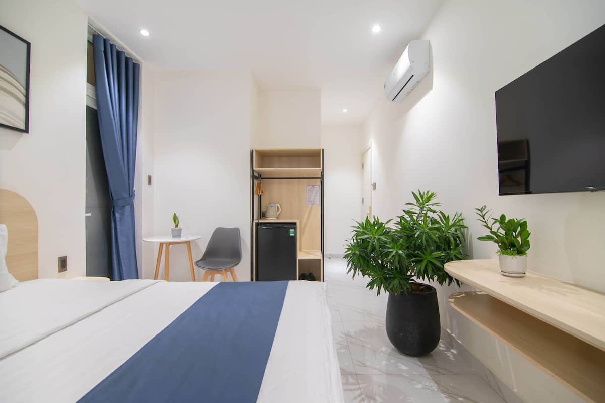 Habitación Deluxe | Escritorio, wifi gratis y ropa de cama