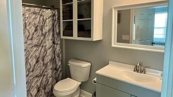Shower, towels, soap, shampoo