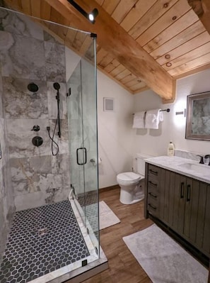 Shower, hair dryer, towels, soap