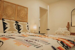 2 bedrooms, desk, iron/ironing board, travel crib