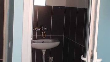 Habitación individual | Baño | Regadera