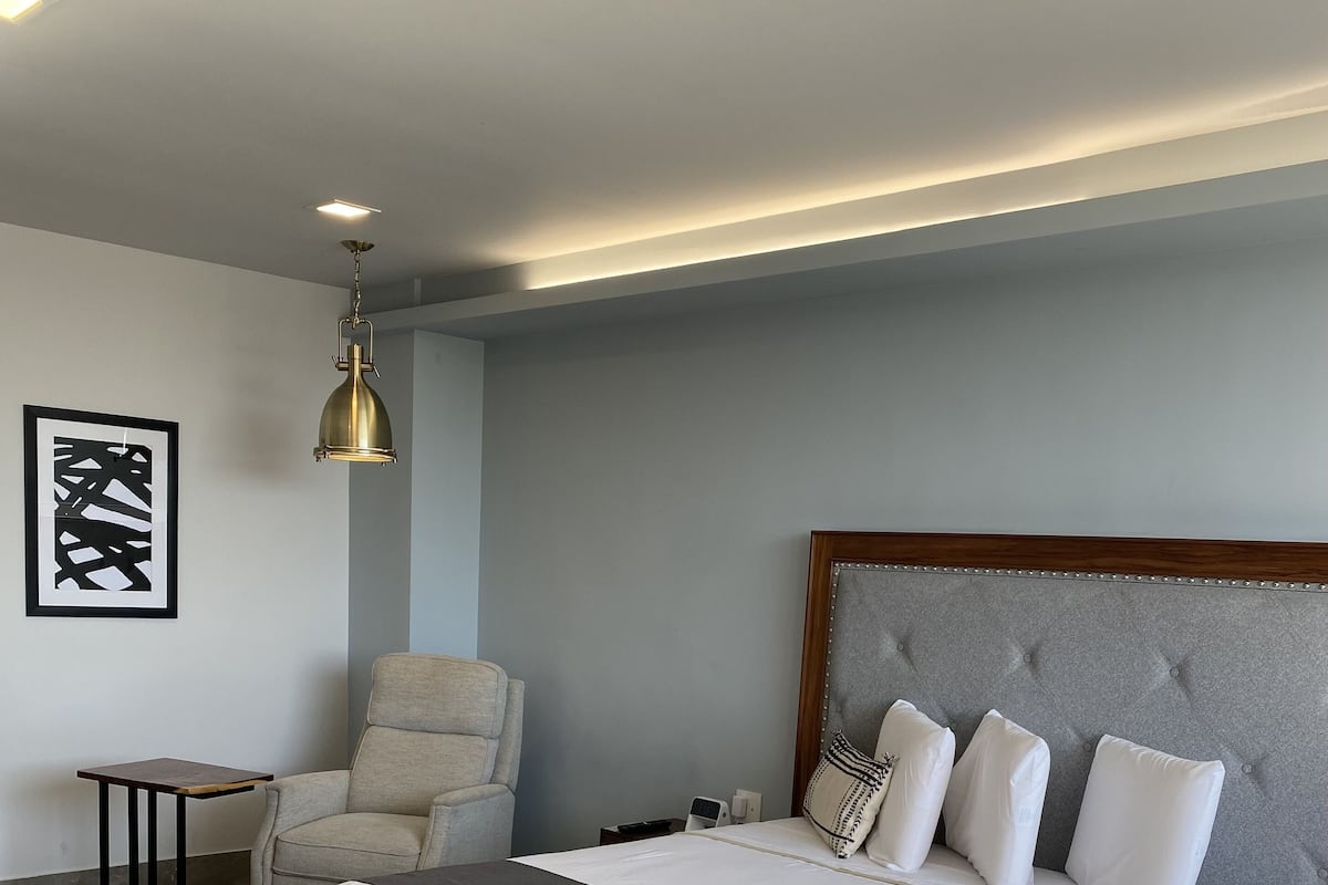 Quarto executivo | Roupas de cama premium, cofres nos quartos, individualmente decorados