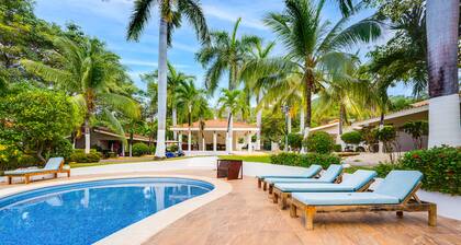 Dog-friendly & convenient villa with an outdoor pool, kitchenette, & gazebo