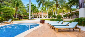 Dog-friendly & convenient villa with an outdoor pool, kitchenette, & gazebo