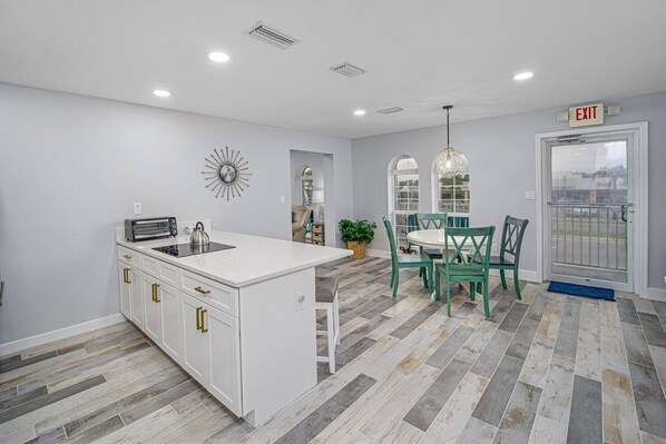 Fridge, microwave, stovetop, coffee/tea maker