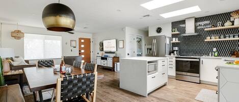 Coffee/tea maker, fridge, microwave, oven
