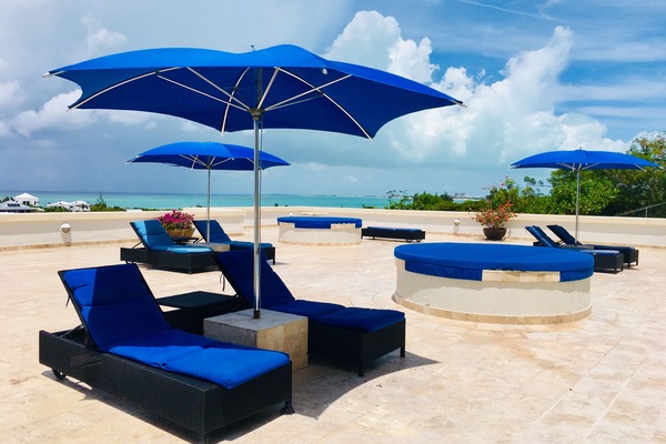 Umbrellas and chairs by the pool