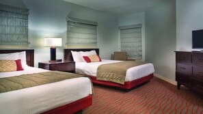 2 chambres, coffres-forts dans les chambres, fer et planche à repasser