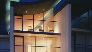 A modern two-story building with large windows and a flat roof. - 2: Apartment with Magnificent Sea Views (Westward Ho!)