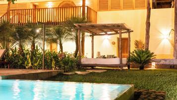 Outdoor pool, open 9:00 AM to 11:00 PM, free pool cabanas, pool loungers