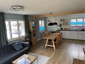 Deluxe-huoneisto | Oleskelualue | Leluja, lämmitetyt lattiat