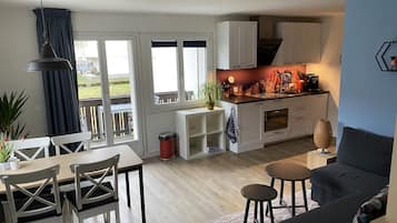 Deluxe Studio | Private kitchen | Fridge, microwave, coffee/tea maker, high chair