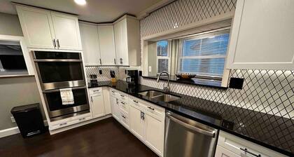 Cheerful home with front porch swing.