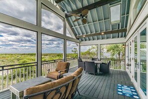 Outdoor dining - Beautiful Ocean front home with stunning views.  Golf cart included! (Saint Helena Island)