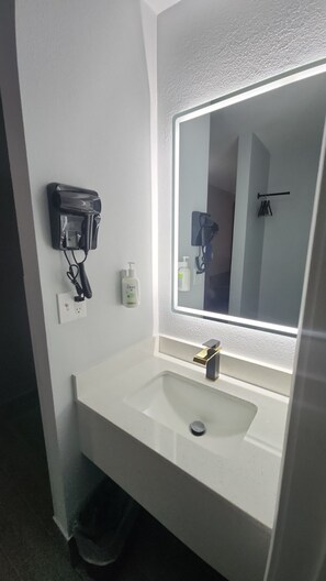 Hair dryer, towels, soap, shampoo