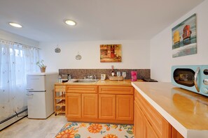 Fridge, microwave, coffee/tea maker, toaster