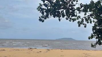 On the beach, sun loungers, beach towels