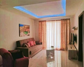 Apartment, Multiple Beds | Living area