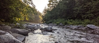 White Mountain scenic river camp with cozy cabin