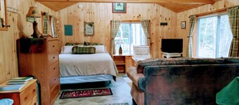 White Mountain scenic river camp with cozy cabin & comfy RV