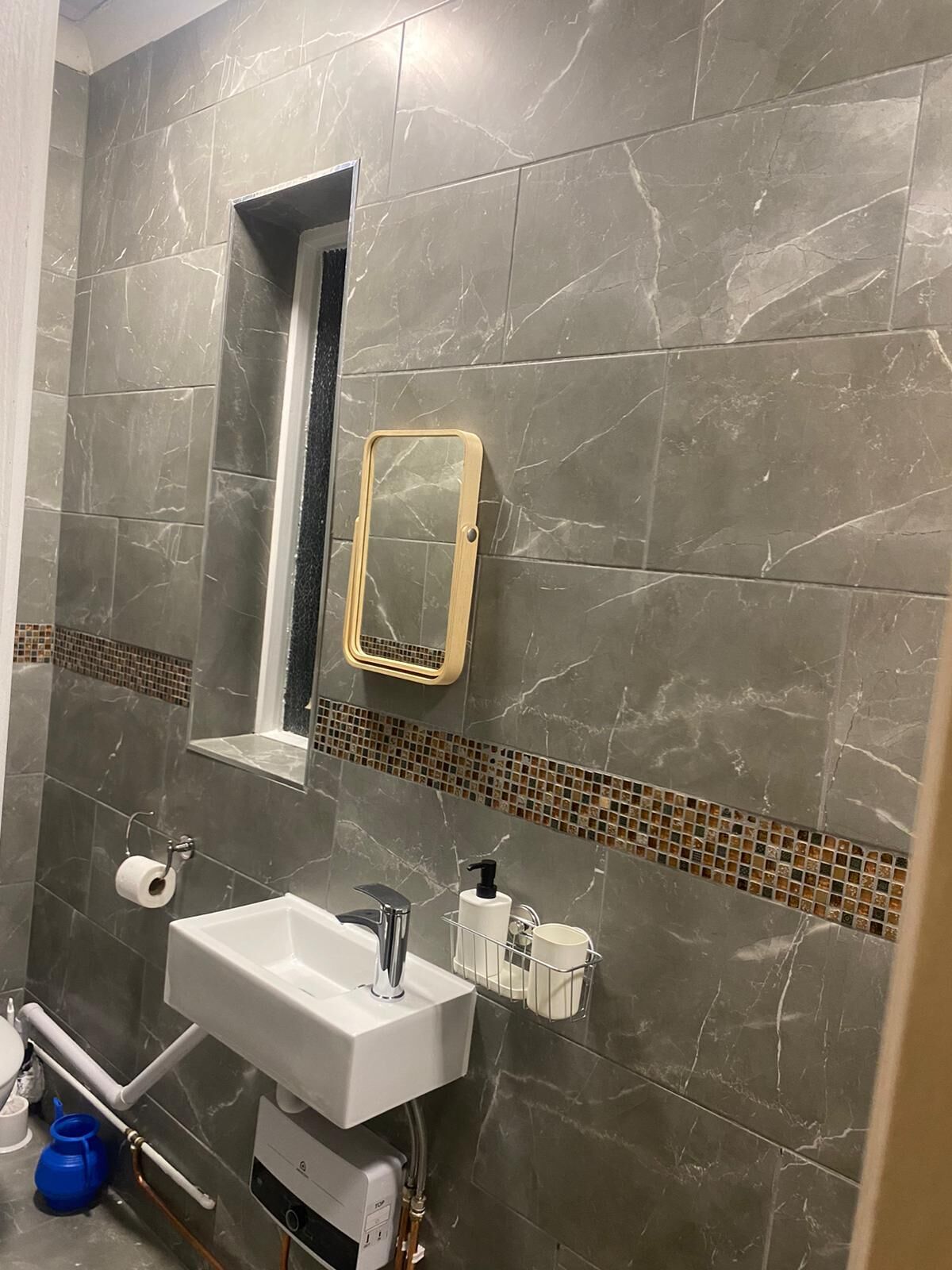 Shower, hair dryer, soap, toilet paper
