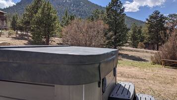 Cabin, 1 Bedroom | Outdoor spa tub