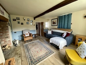 Cottage, plusieurs lits | 4 chambres, fer et planche à repasser, Wi-Fi gratuit, draps fournis