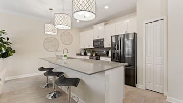 Townhome, 4 Bedrooms | Private kitchen | Coffee/tea maker, fridge, oven, toaster