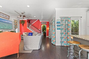 House, Multiple Beds, Kitchen, Garden View | Living area | 40-inch TV with cable channels - The FUN Orange Home in a Great Location With Bonus Game Room (Panama City Beach)