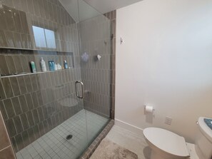 Shower, hair dryer, towels, soap