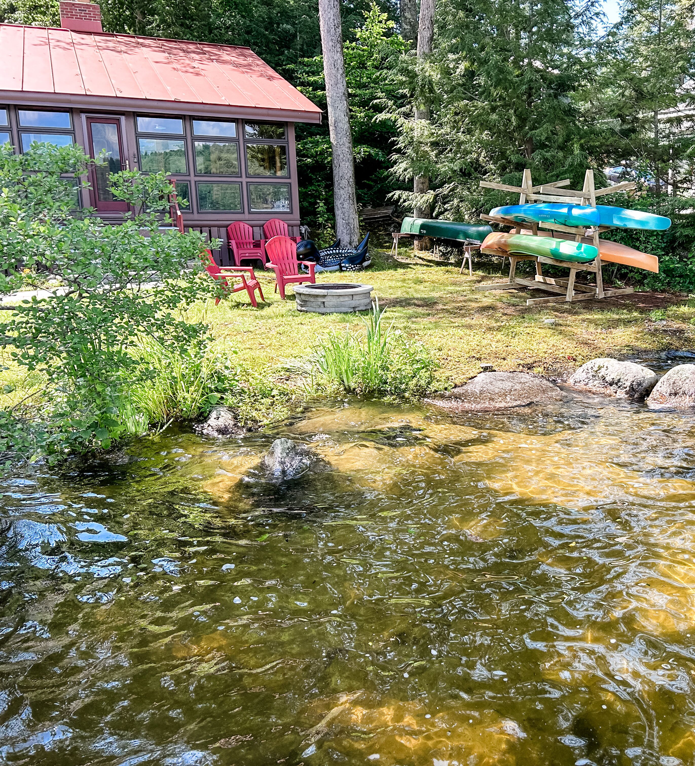 Peaceful lake front cottage w/large dock and sandy beach entry