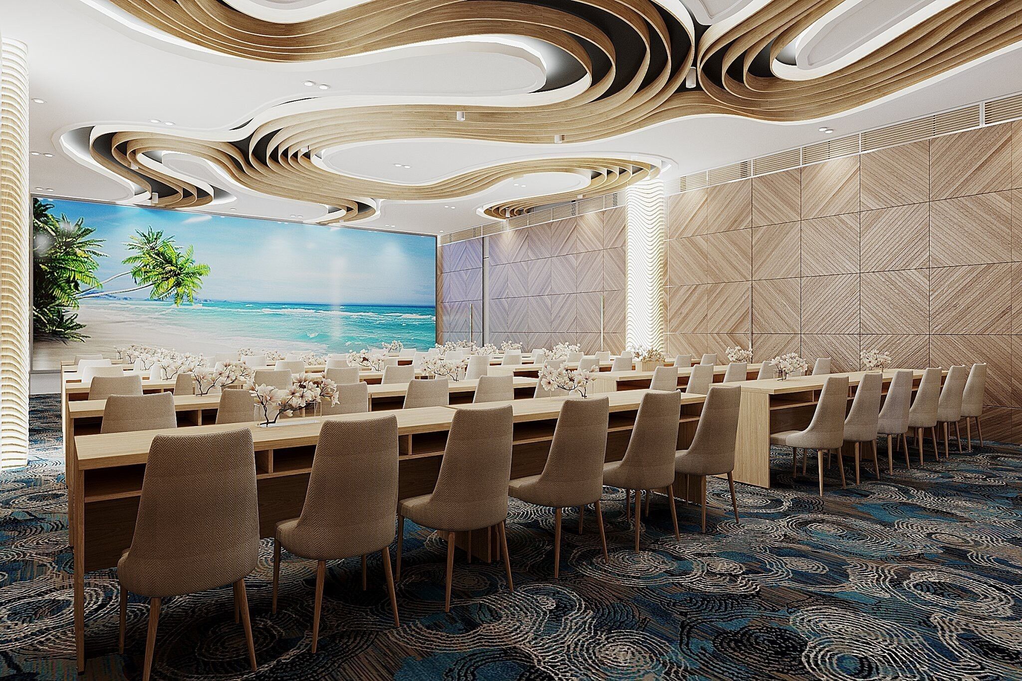 A conference room with a long table, chairs, a large screen, and a tropical beach mural.